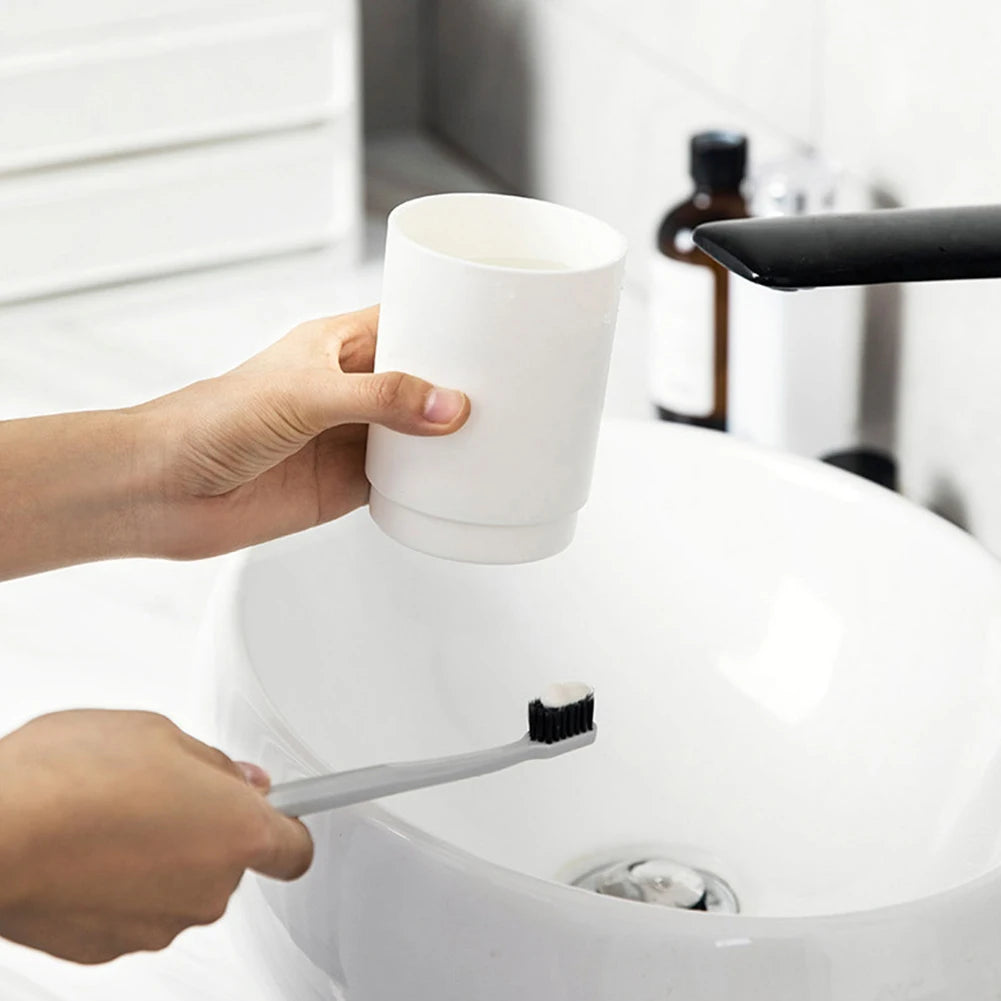 Wall-Mounted Toothbrush Holder for organizing your bathroom.