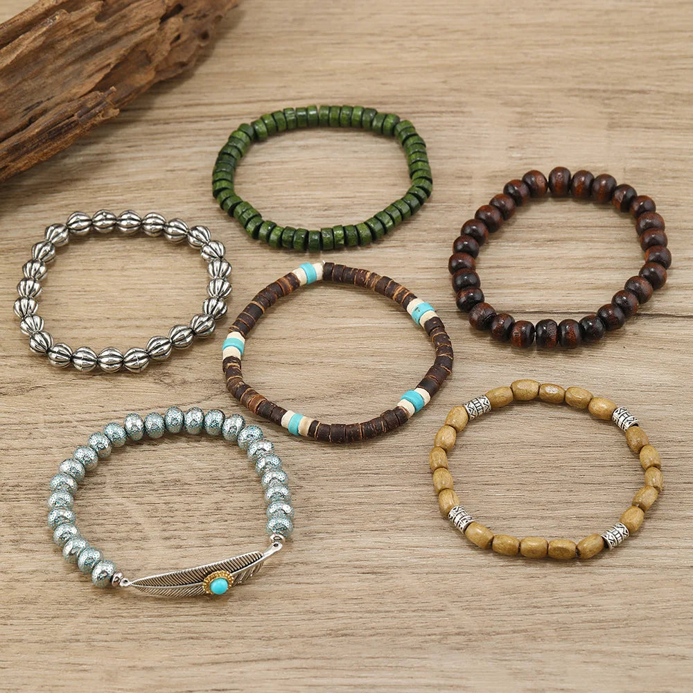 Juego de pulseras con dijes bohemios: pluma, ojo malvado, mano de Fátima y más