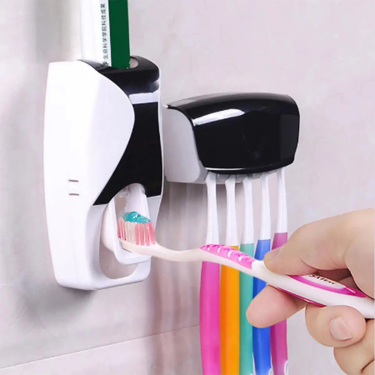 Dispensador automático de pasta de dientes y portacepillos de pared