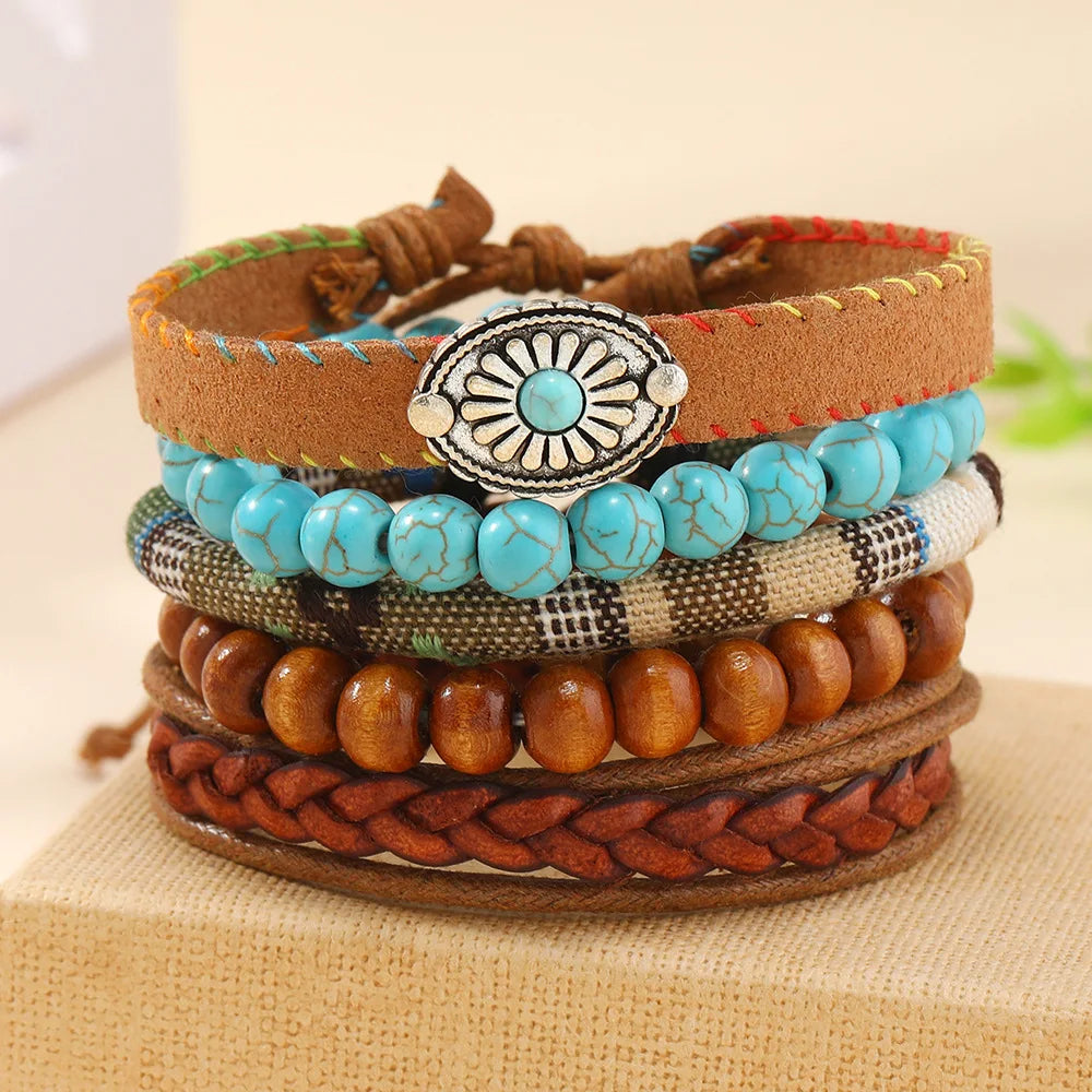 Juego de pulseras con dijes bohemios: pluma, ojo malvado, mano de Fátima y más