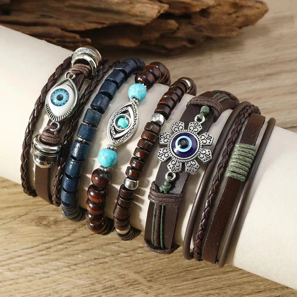 Juego de pulseras con dijes bohemios: pluma, ojo malvado, mano de Fátima y más